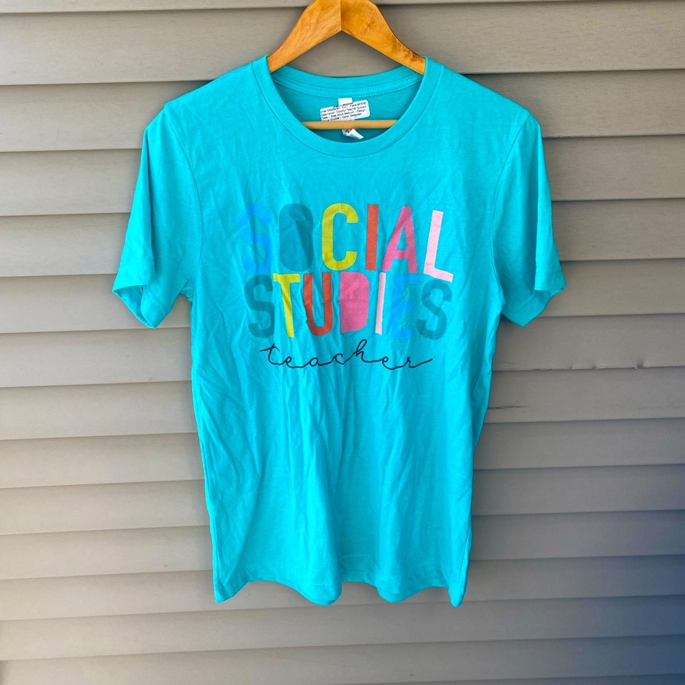 BNWT Bella Canvas Social Studies Teacher T-Shirt - Women’s Size M